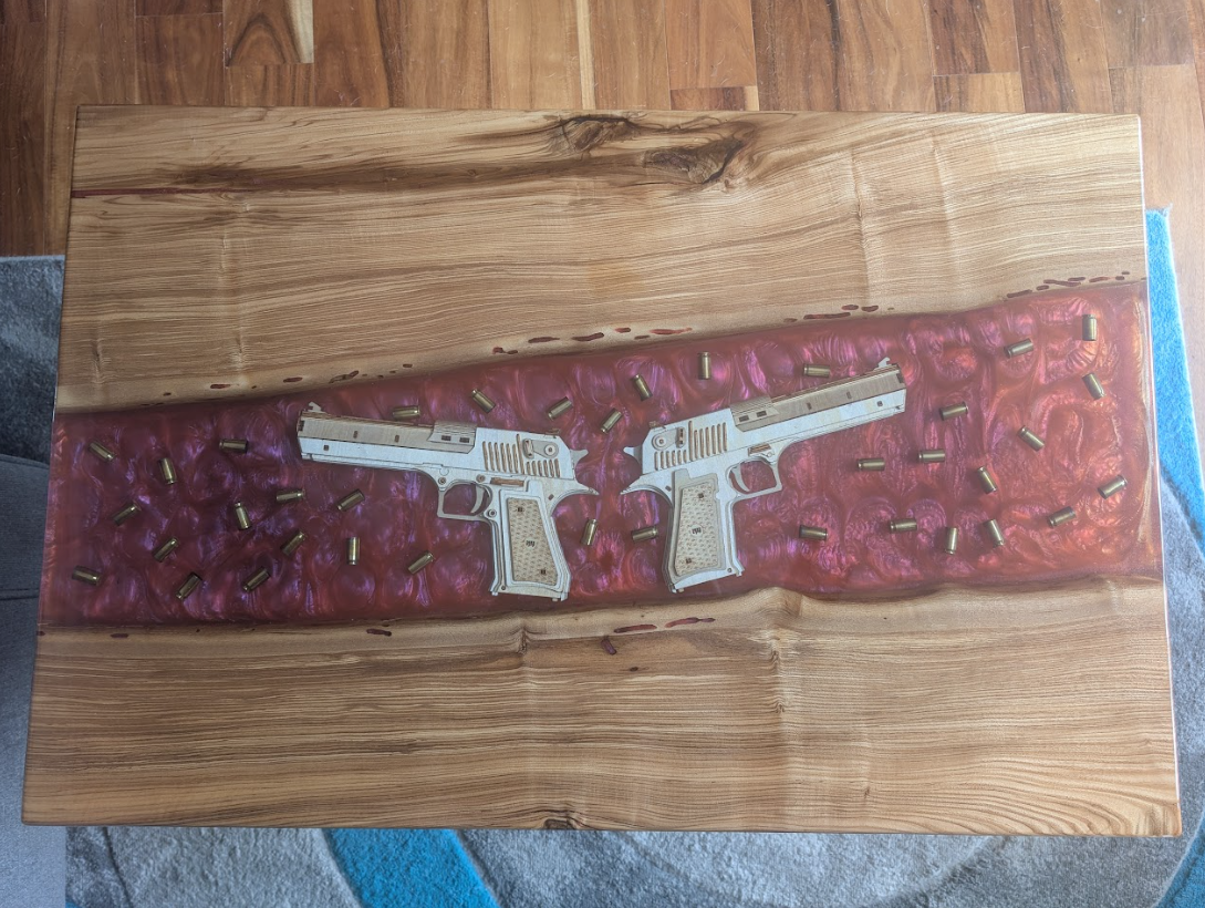 Handmade wood and resin coffee table top with deep river-style resin detail