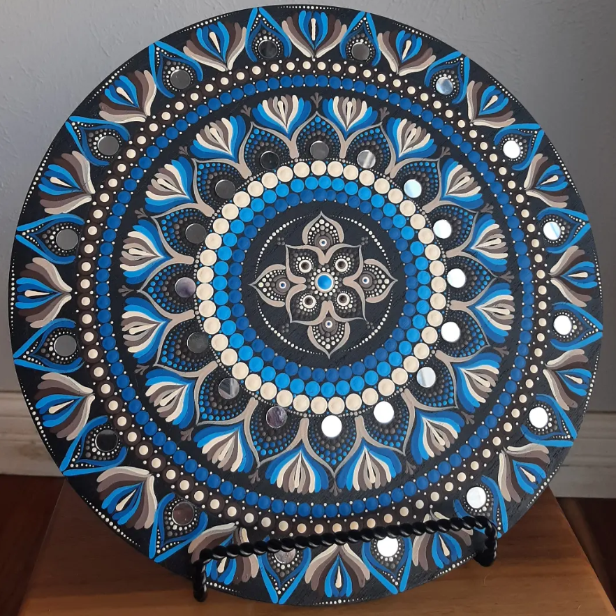 Close up mandala artwork with hand painted detail