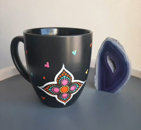 Handmade mandala cup with intricate decorative design