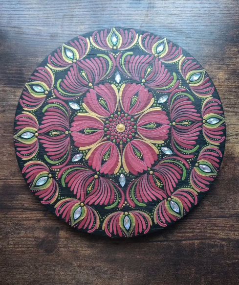 Mandala wall art piece with colorful handmade detail