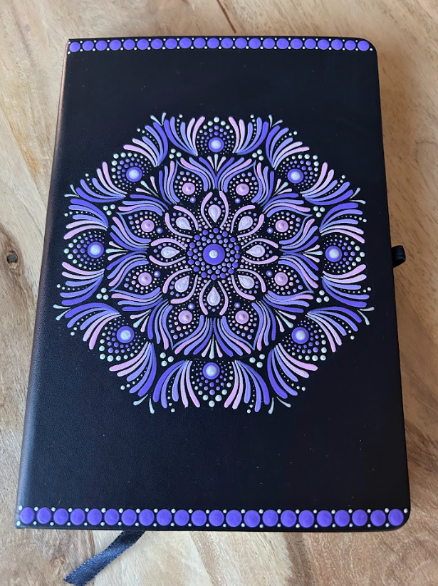 Purple journal cover with handmade mandala artwork