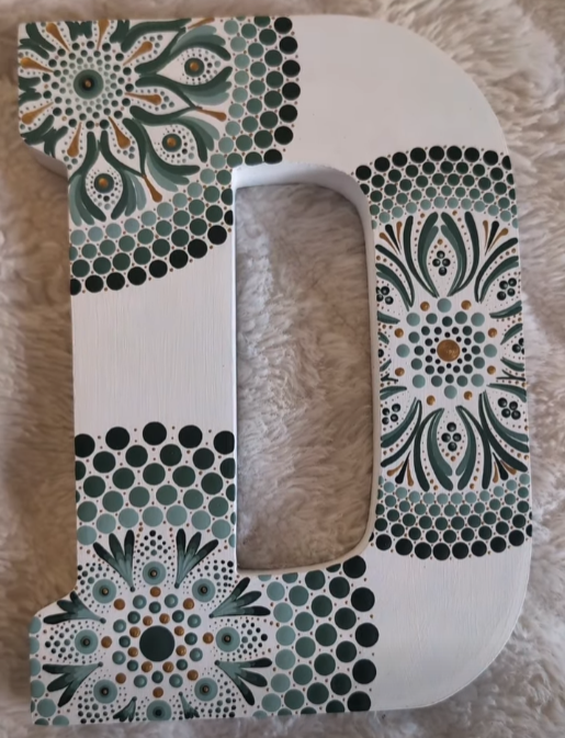 Close up detail of a personalized wooden initial handmade gift